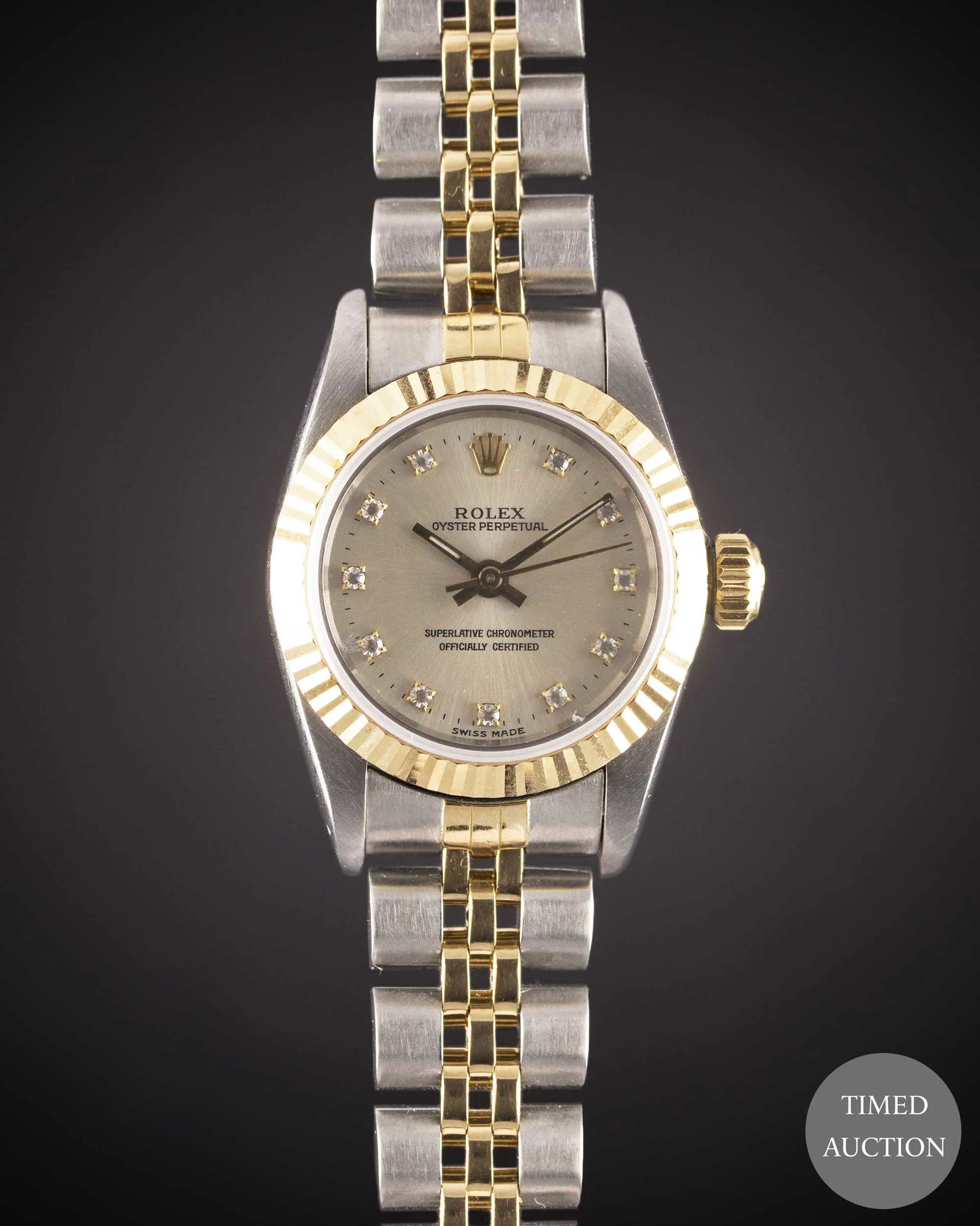 Rolex Oyster Perpetual 67193 24mm Yellow gold and Stainless steel Silver