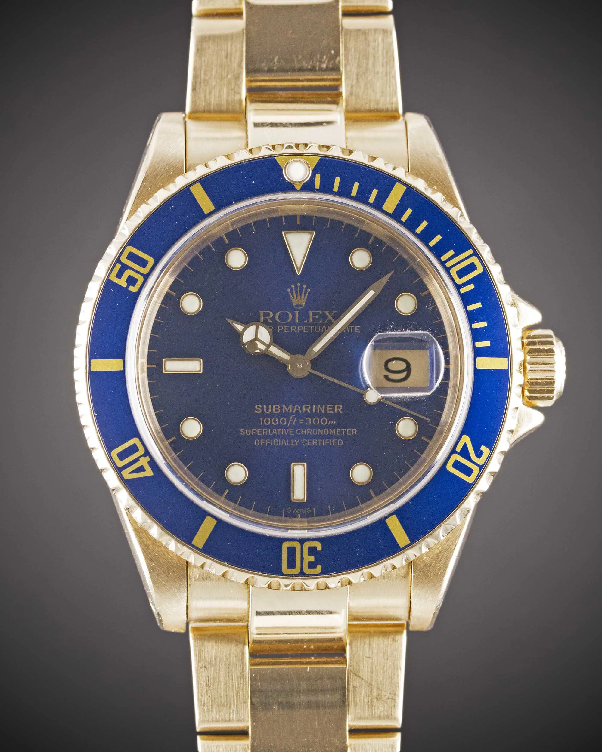 Rolex Submariner 16618 40mm 18k yellow gold Blue