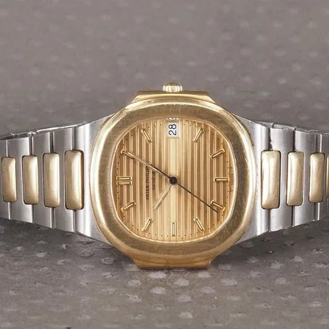 Patek Philippe Nautilus 3900/1 33mm Yellow gold Champagne