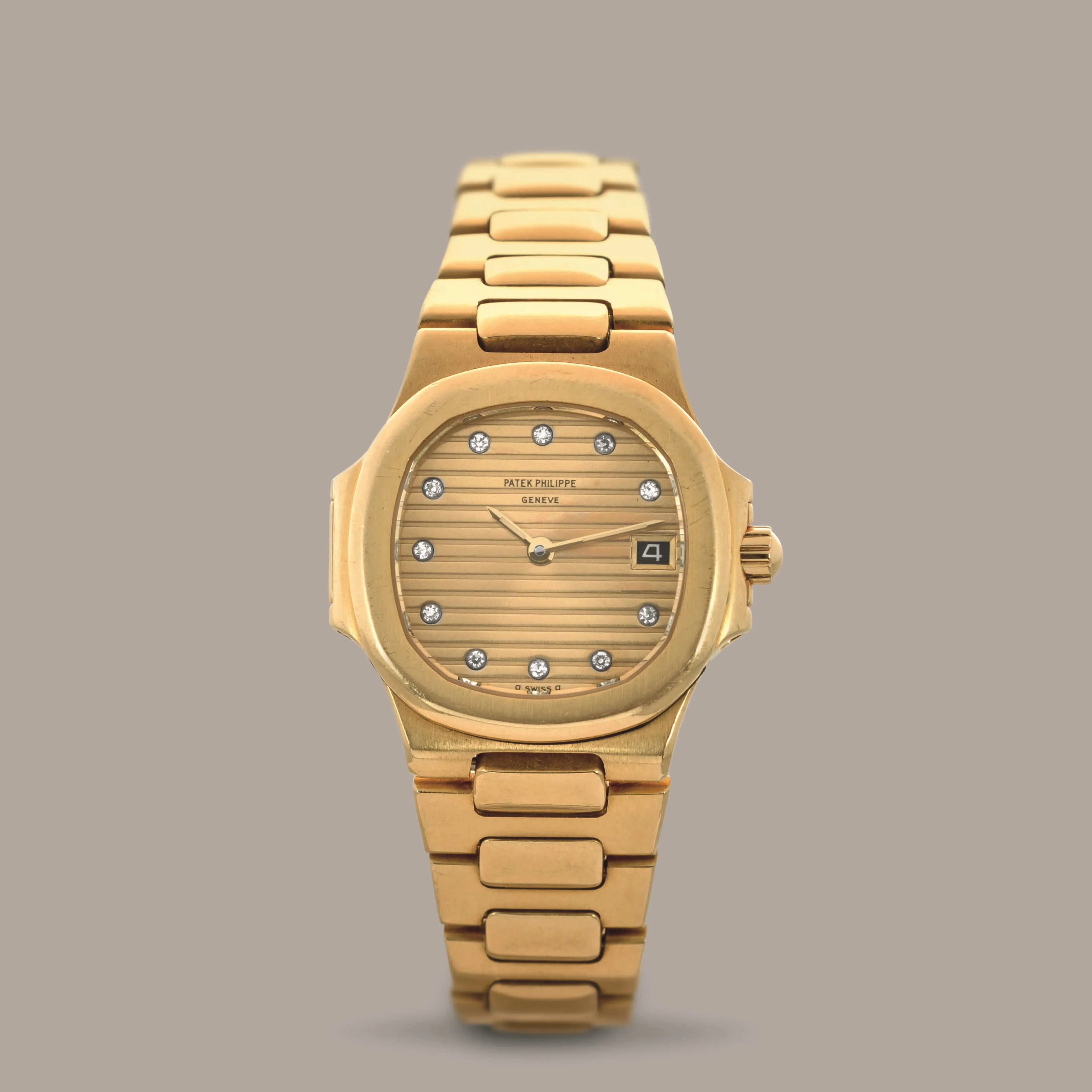 Patek Philippe Nautilus 4700/1J 27mm Yellow gold Golden