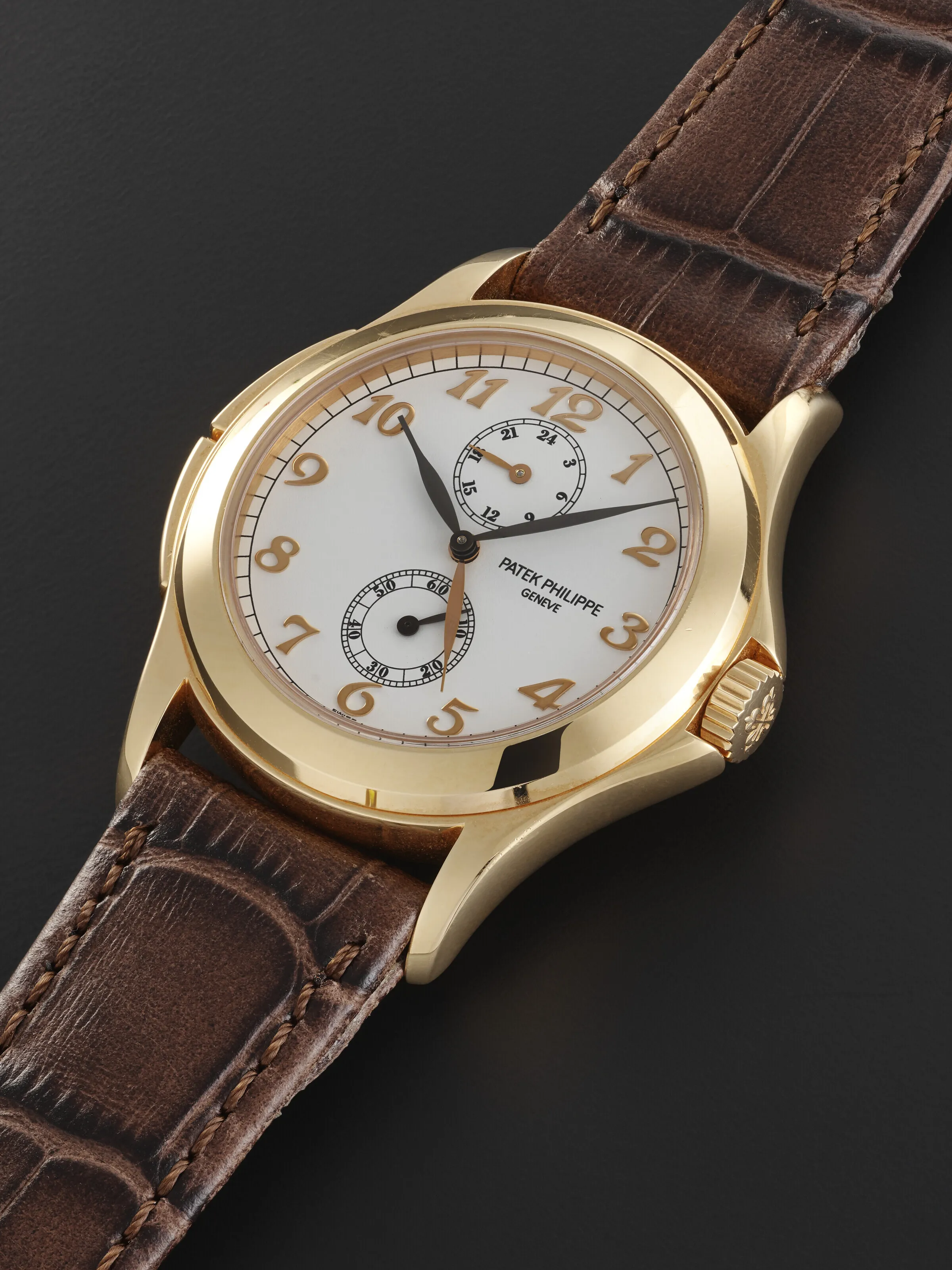 Patek Philippe Travel Time 35mm Rose gold White 1