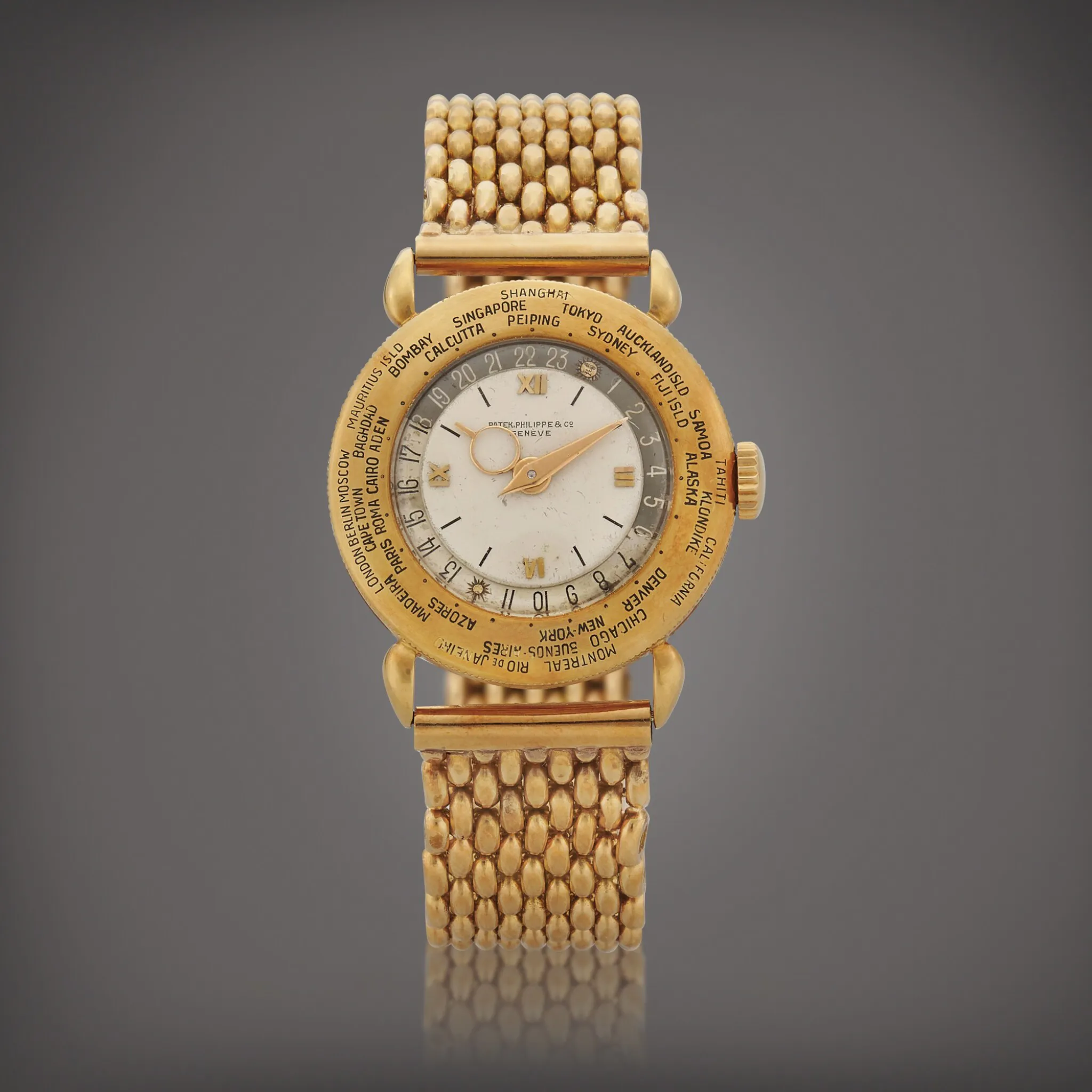 Patek Philippe World Time 1415 31mm Yellow gold White