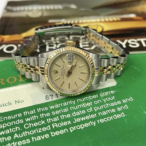 Rolex Lady-Datejust 69173 26mm Gold/steel Champagne