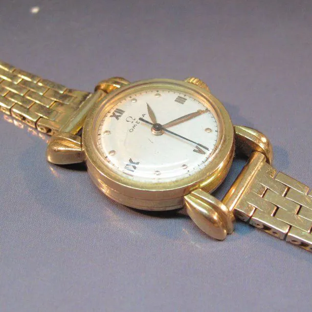 Omega Yellow gold White