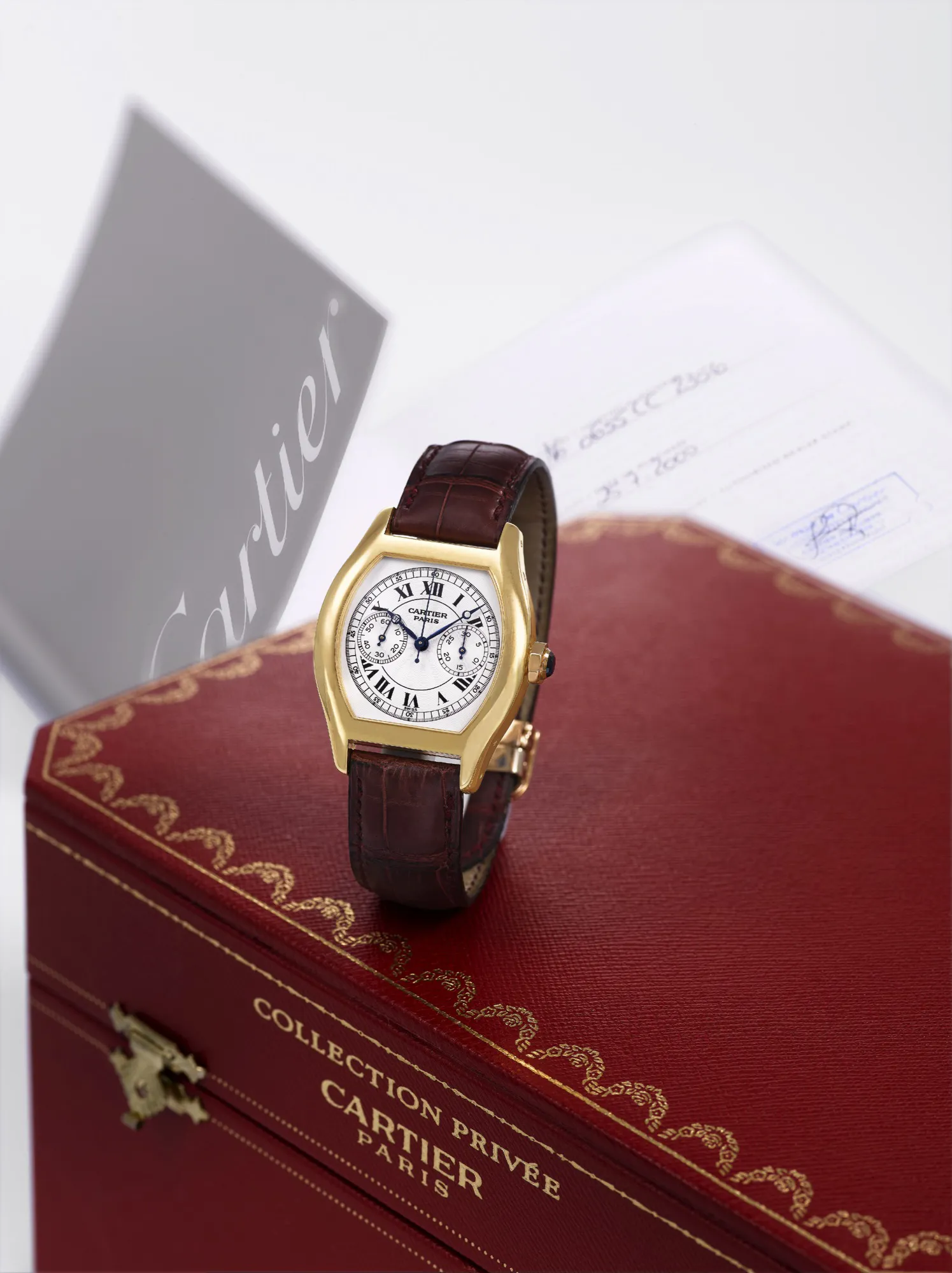 Cartier Tonneau 2356 34mm Yellow gold Guilloché Silver