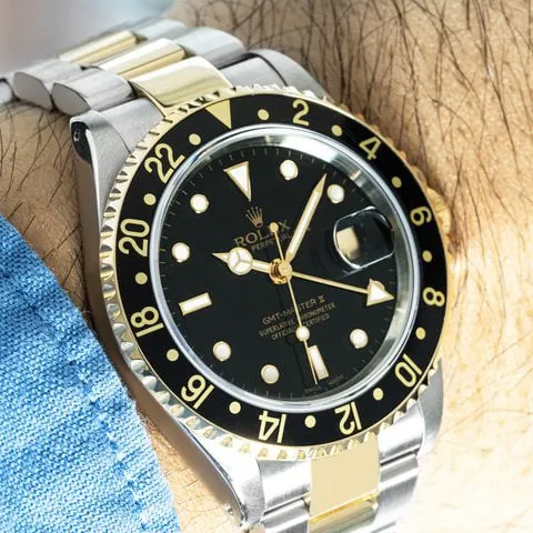 Rolex GMT-Master II 16713 40mm Yellow gold and Stainless steel Black