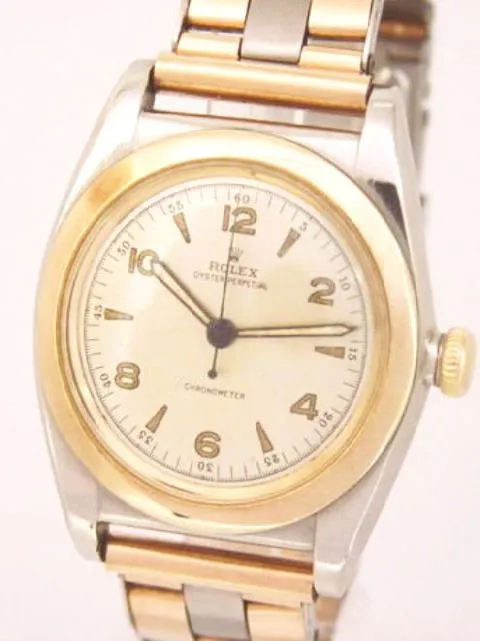 Rolex Oyster Perpetual 3133 32mm Yellow gold and stainless steel Silver