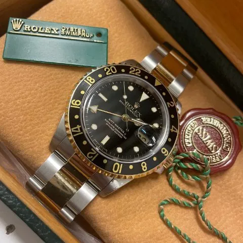 Rolex GMT-Master II 16713 40mm Yellow gold and Stainless steel Black