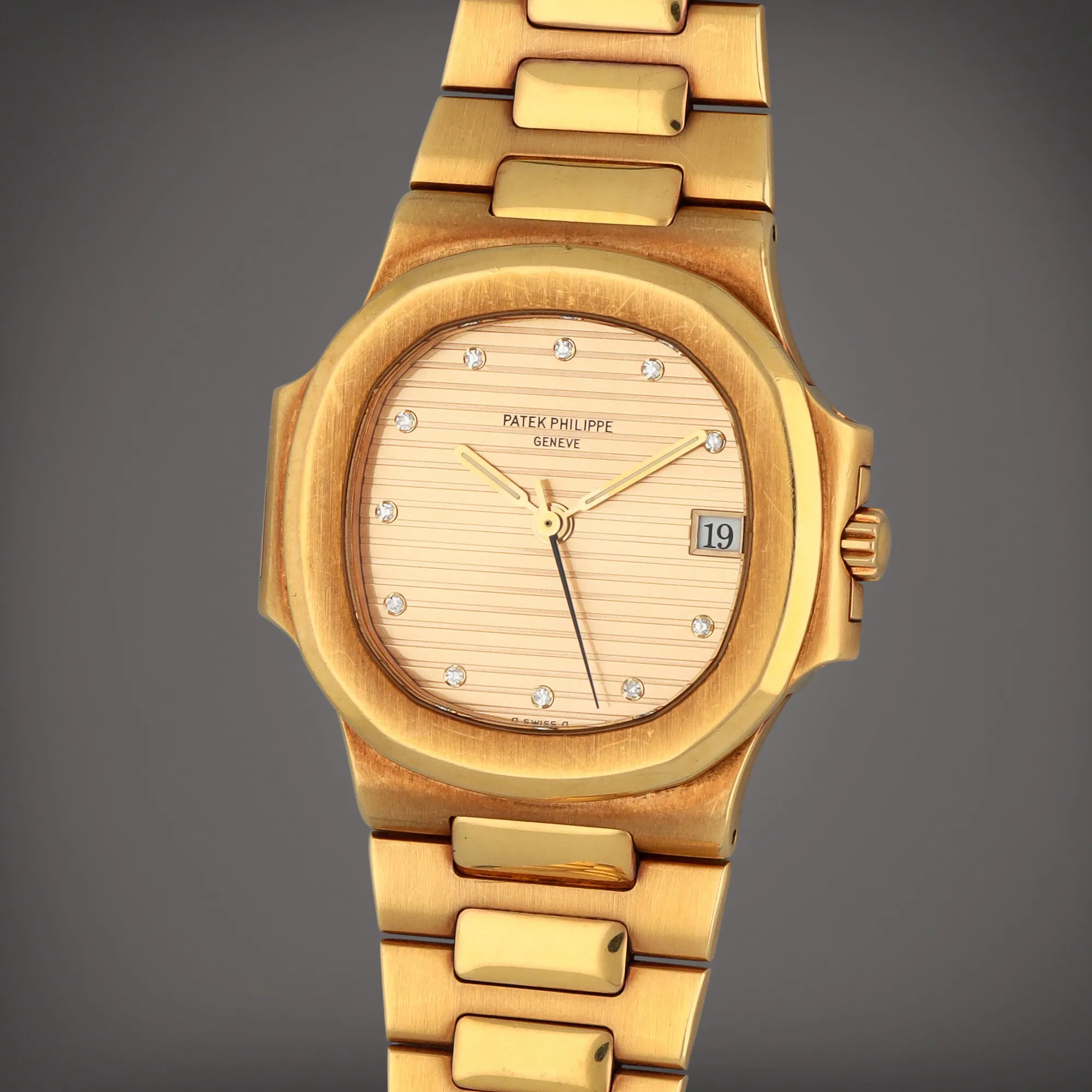 Patek Philippe Nautilus 3800/1J 37.5mm Yellow gold Gilt dial