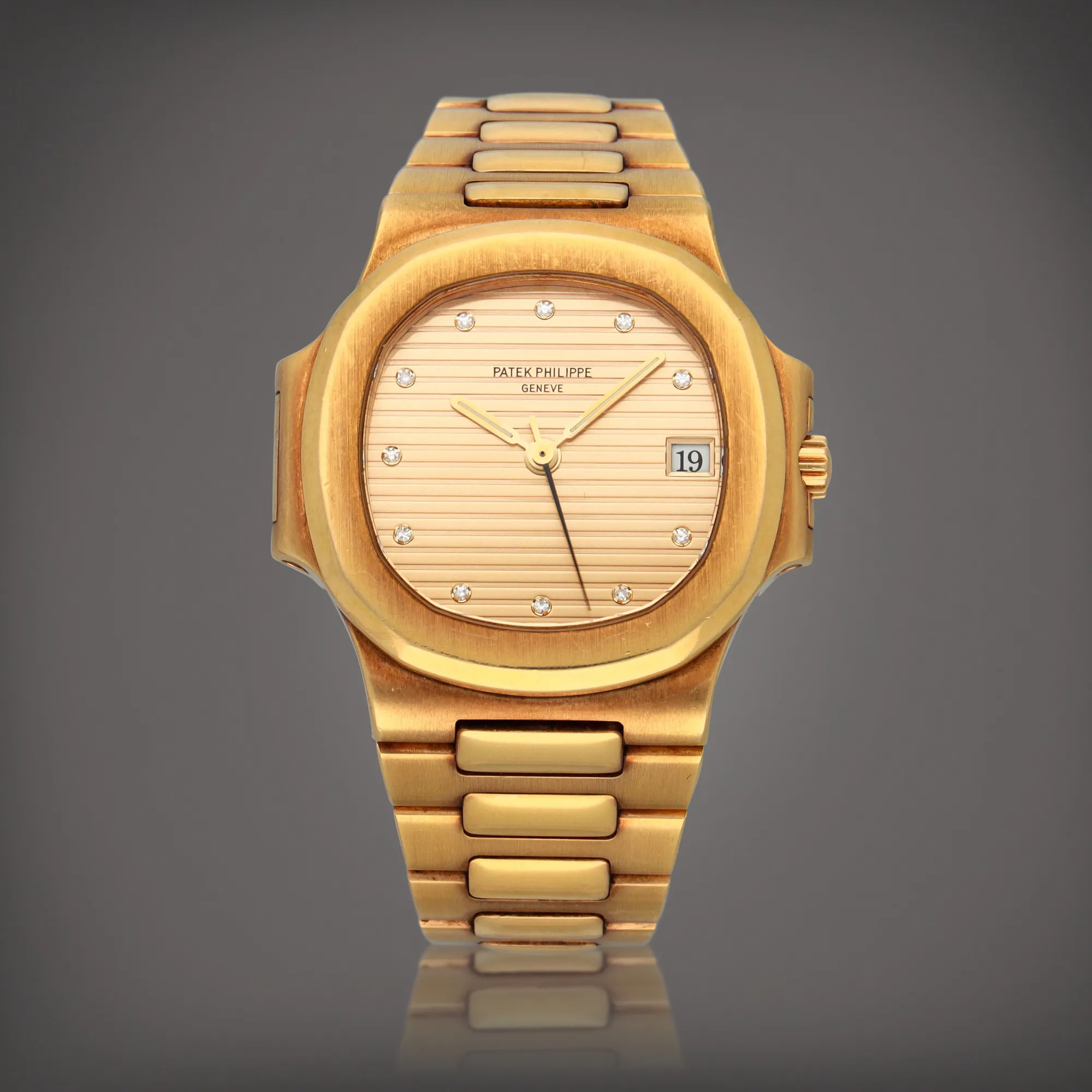 Patek Philippe Nautilus 3800/1J 37.5mm Yellow gold Gilt dial 1