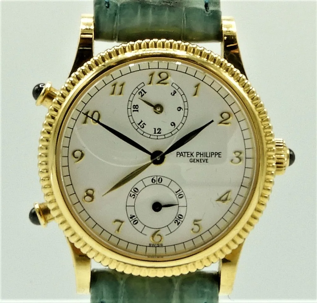 Patek Philippe Travel Time 4864J 29mm Yellow gold White