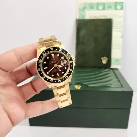 Rolex GMT-Master II 16718 40mm Yellow gold Black