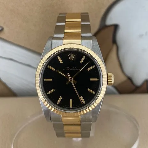 Rolex Oyster Perpetual 31 67513 30mm Gold/steel Black