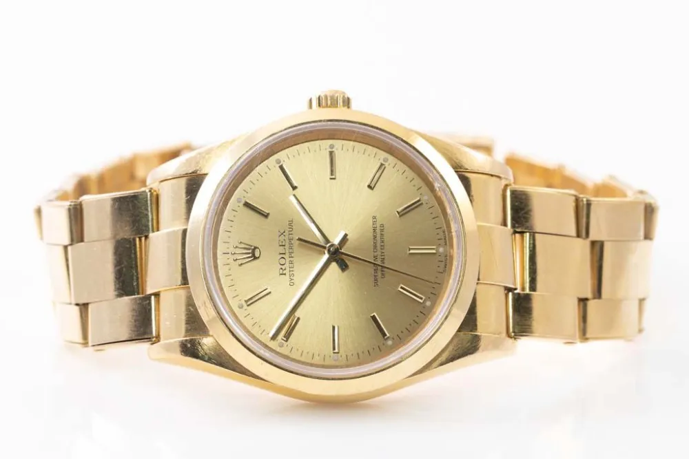 Rolex Oyster Perpetual 34 14208 34mm Yellow gold Champagne