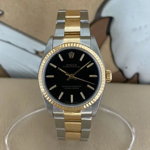 Rolex Oyster Perpetual 31 67513 30mm Gold/steel Black