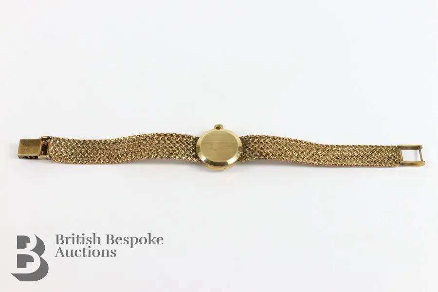 Omega Ladymatic 18mm Yellow gold Champagne 4