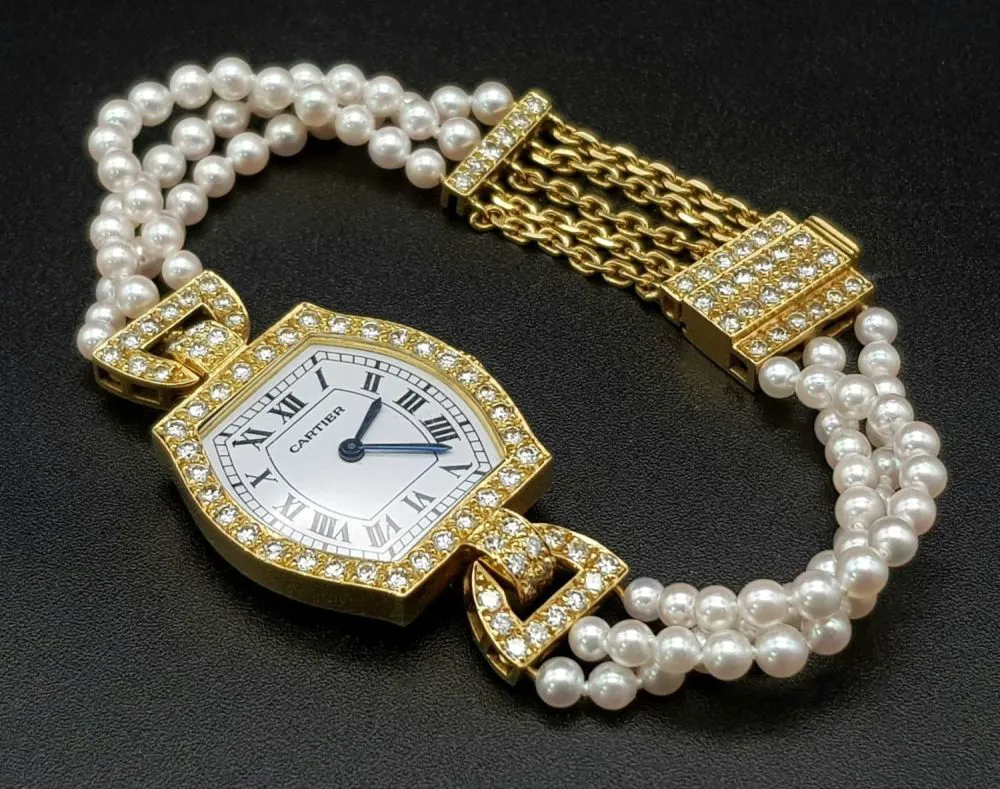 Cartier Must de Cartier 22mm Yellow gold and diamond-set White