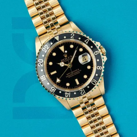 Rolex GMT-Master II 16718 40mm Yellow gold Black