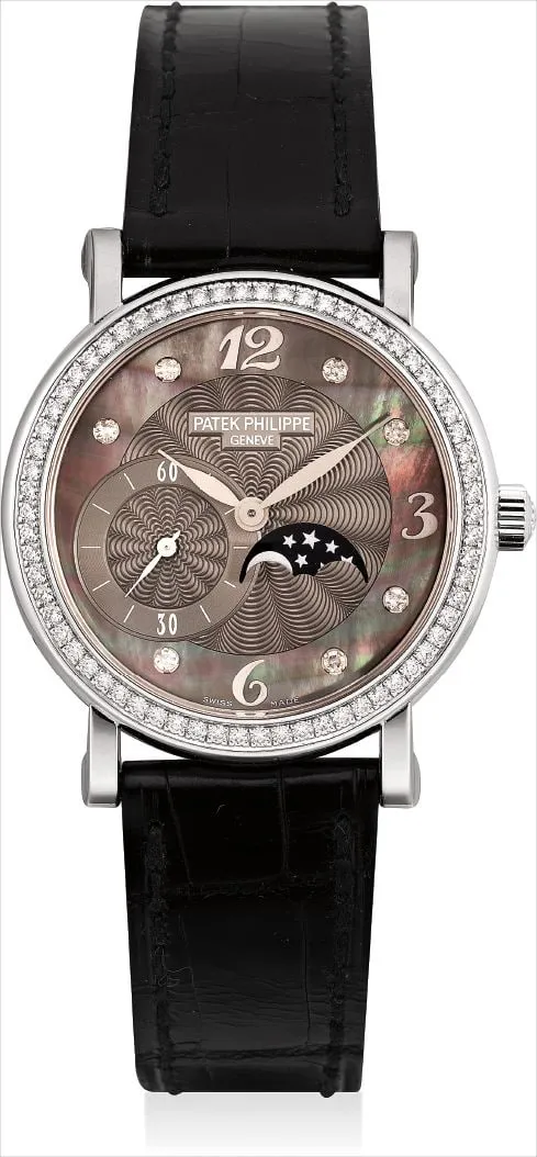 Patek Philippe 4958 31mm White gold and Diamond Mother of pearl and guilloché