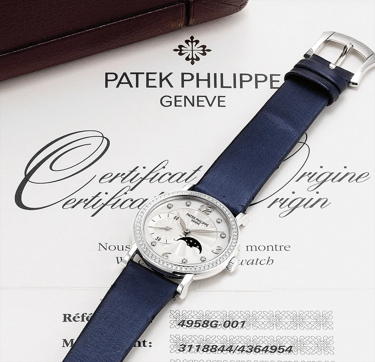 Patek Philippe 4958G-001 31mm White gold and Diamond Mother-of-pearl