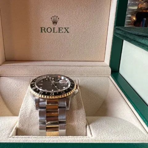 Rolex GMT-Master II 16713 40mm Yellow gold and Stainless steel Black