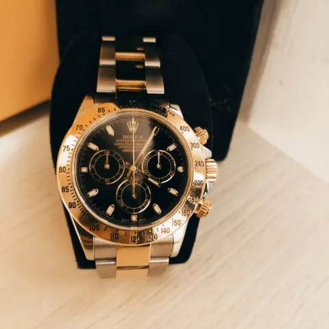 Rolex Daytona 116523 40mm Yellow gold and Stainless steel Black