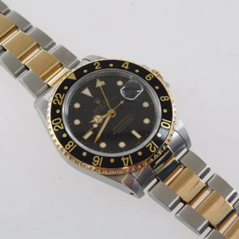 Rolex GMT-Master II 16713 40mm Yellow gold and Stainless steel Black