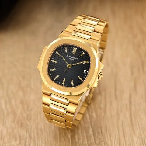 Patek Philippe Nautilus 3800/1 37mm Yellow gold Black