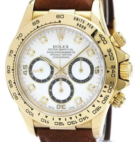 Rolex Daytona 16518G 40mm Yellow gold White