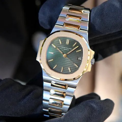 Patek Philippe Nautilus 3800/1 37mm Yellow gold and Stainless steel Black