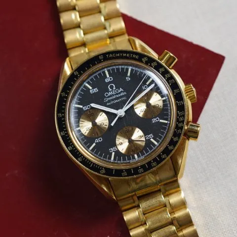 Omega Speedmaster 3112.50.00 39mm Yellow gold Black