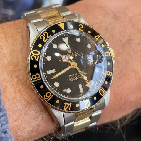 Rolex GMT-Master 16753 40mm Yellow gold and Stainless steel Black