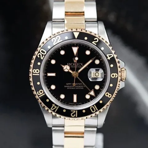 Rolex GMT-Master II 16713 40mm Yellow gold and Stainless steel Black