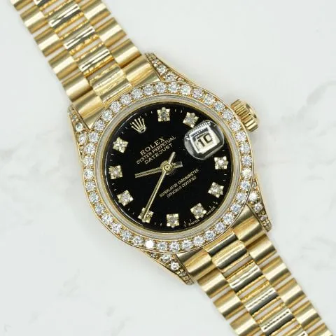 Rolex Lady-Datejust 69158 26mm Yellow gold Black