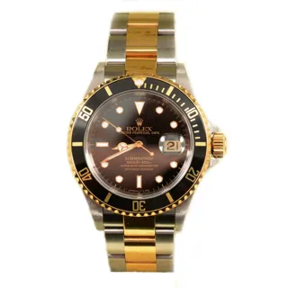 Rolex Submariner Date Yellow gold and Stainless steel Black