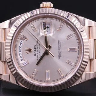 Rolex Day-Date 40 228235 Everose gold Sundust$Baguette