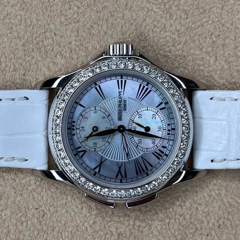 Patek Philippe Travel Time 35mm White gold Mother-of-pearl 1