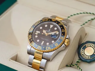 Rolex GMT-Master II 116713 Yellow gold and Stainless steel Black