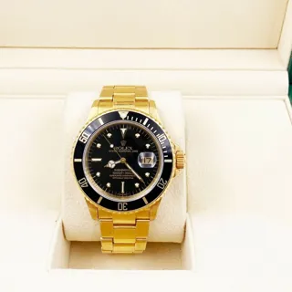 Rolex Submariner 16808 Yellow gold Black