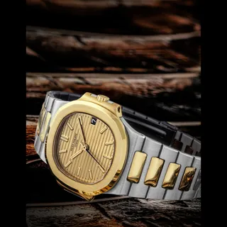 Patek Philippe Nautilus 3800/001JA Yellow gold and Stainless steel Golden