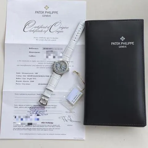 Patek Philippe Travel Time 35mm White gold Mother-of-pearl