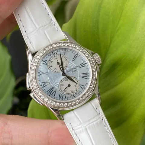 Patek Philippe Travel Time 35mm White gold Mother-of-pearl 2