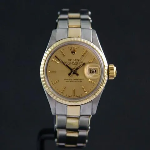 Rolex Oyster Perpetual Lady Date 6517 26mm Yellow gold and stainless steel Champagne