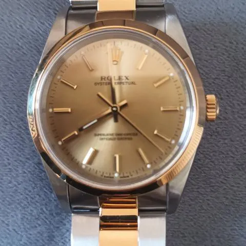 Rolex Oyster Perpetual 34 14203 34mm Yellow gold and stainless steel Champagne