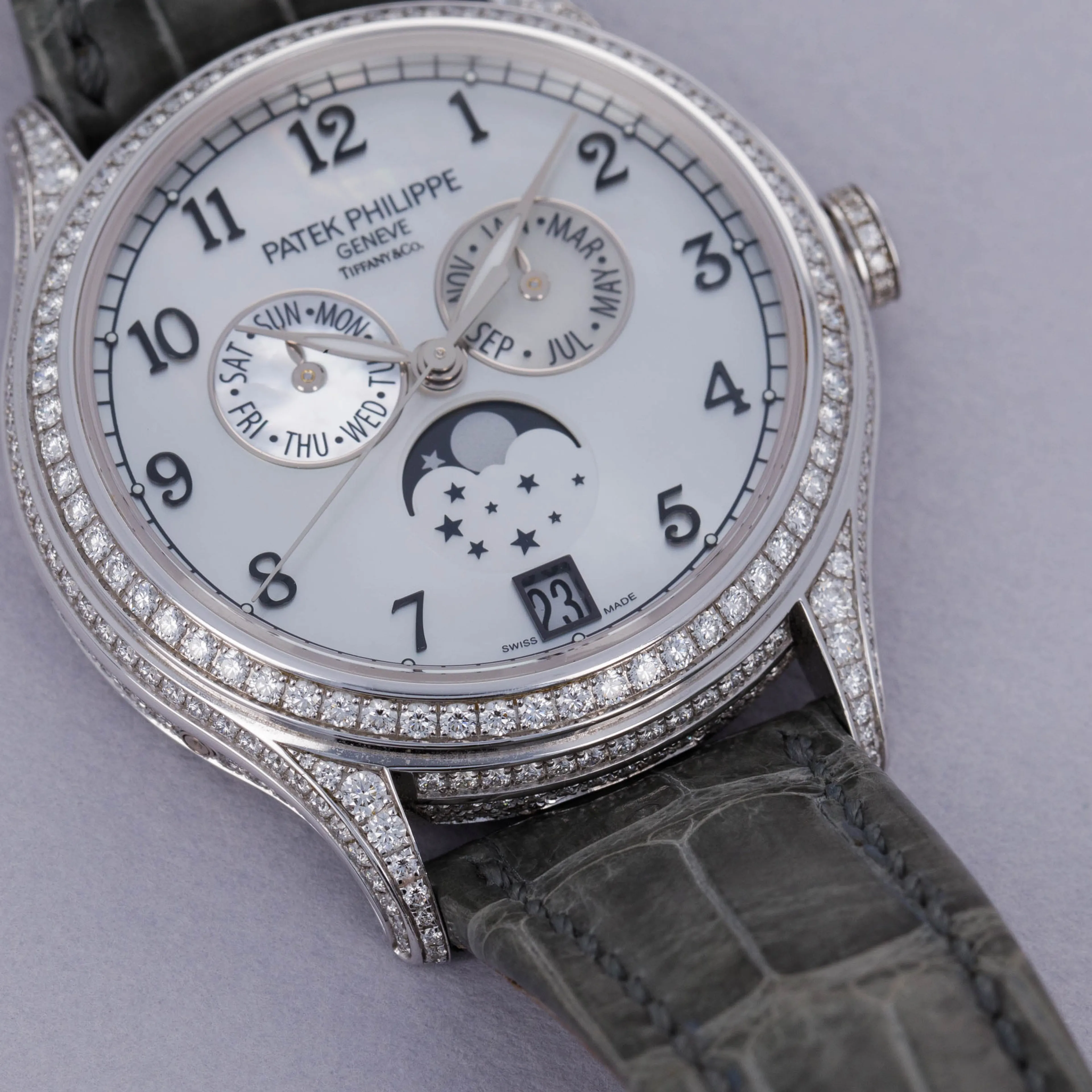 Patek Philippe Annual Calendar 4948G-010 38mm White gold and Diamond White Mother of Pearl 1