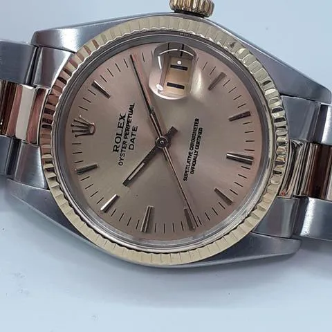 Rolex Oyster Perpetual Date 1500 34mm Yellow gold and stainless steel Champagne