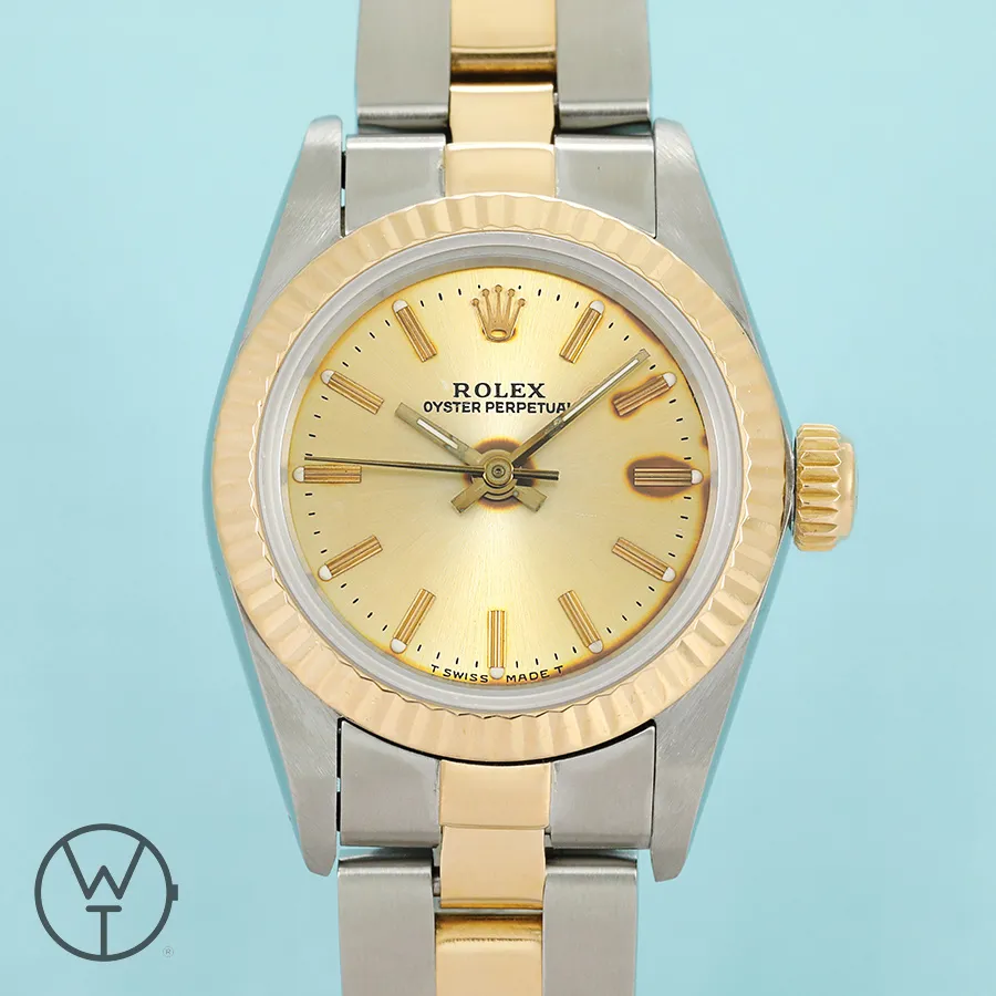 Rolex Oyster Perpetual 67193 24mm Yellow gold and Stainless steel Champagne