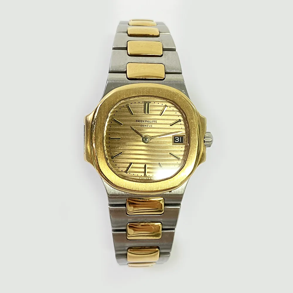 Patek Philippe Nautilus 4700 27mm Yellow gold and Stainless steel Champagne