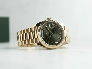 Rolex Day-Date 40 228235 Everose gold Green