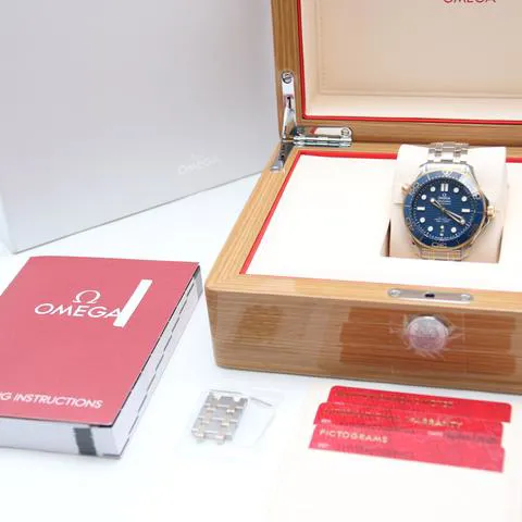 Omega Seamaster Diver 300M 210.20.42.20.03.001 42mm Yellow gold and Stainless steel Blue 1